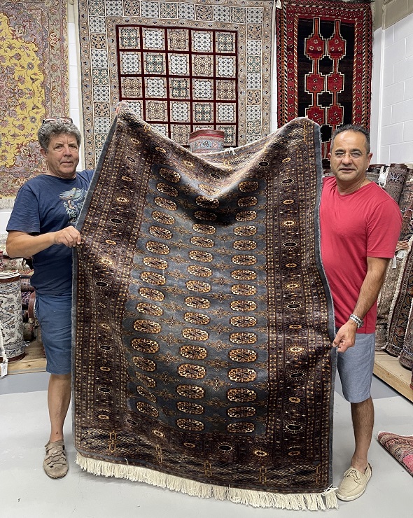 rug repaired photo with owner - Dave