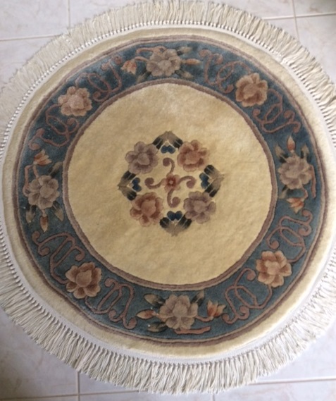 Round rug replaced damaged fringing