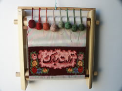 Happy Birthday words in Farsi on a rug