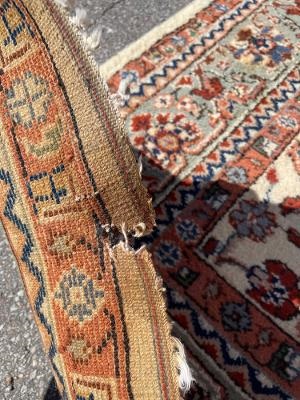 Back View of Cut Damage on Handmade Rug