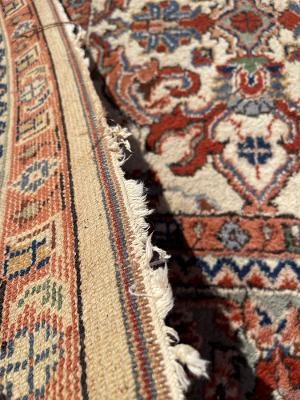 Back View of Fringes Damage on Handmade Rug
