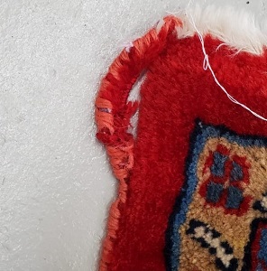 Rug binding repair - before