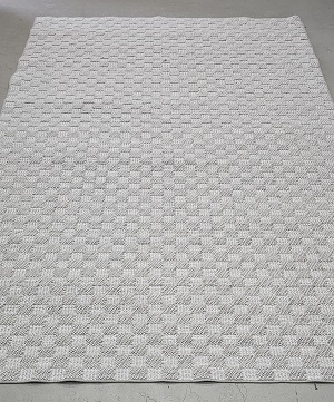 Attached two 5 x 7 rugs to one10 x 7